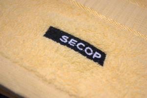 Detail loga firmy Secop